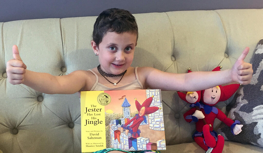 jester-kid-smiling-with-book